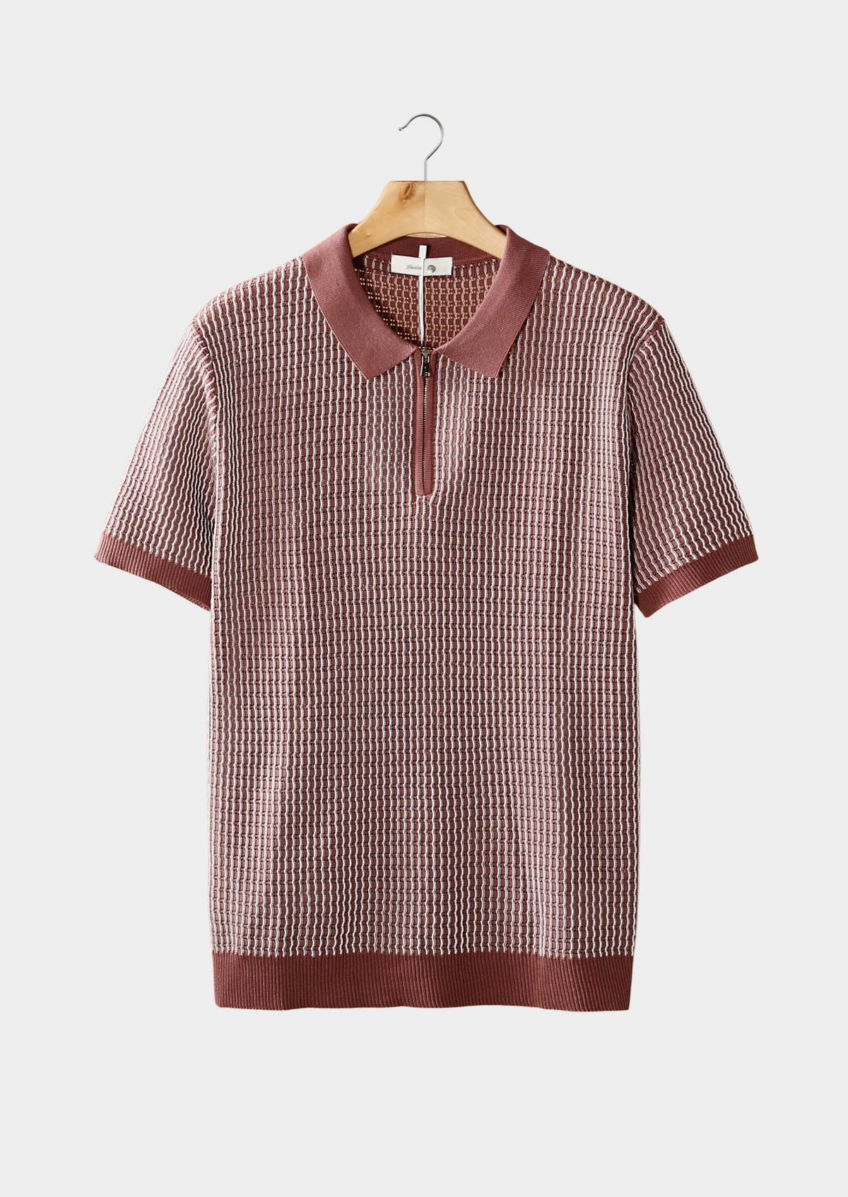 Polo zippé texturé géométrique rose poudré