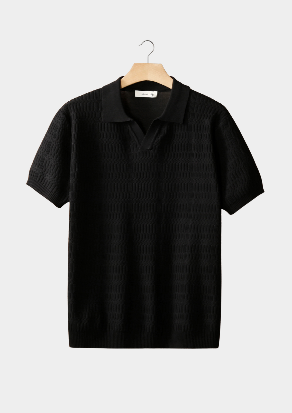 Polo en maille à motifs sans boutons noir