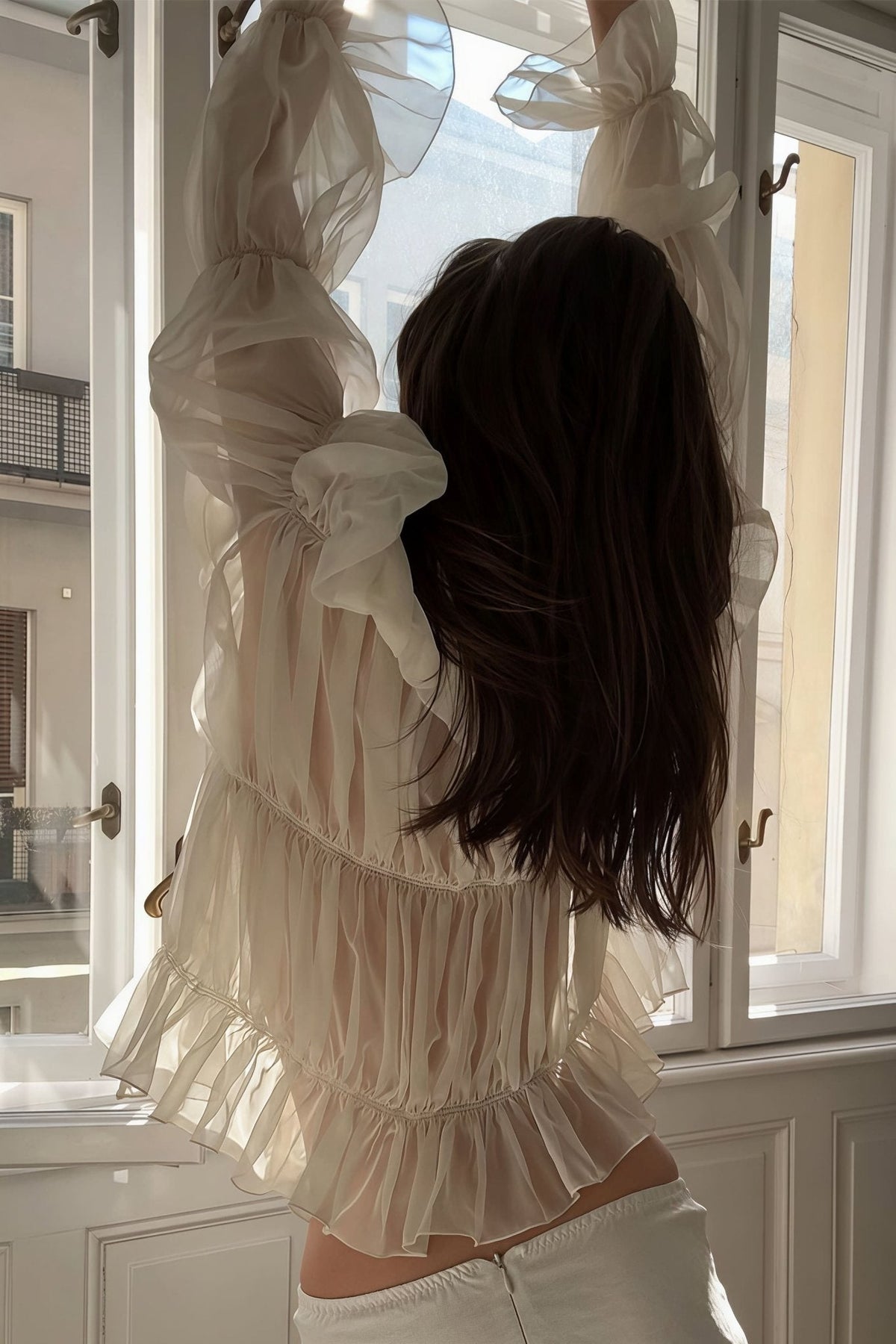 Blouse Carmen froncée à volants et à nœud