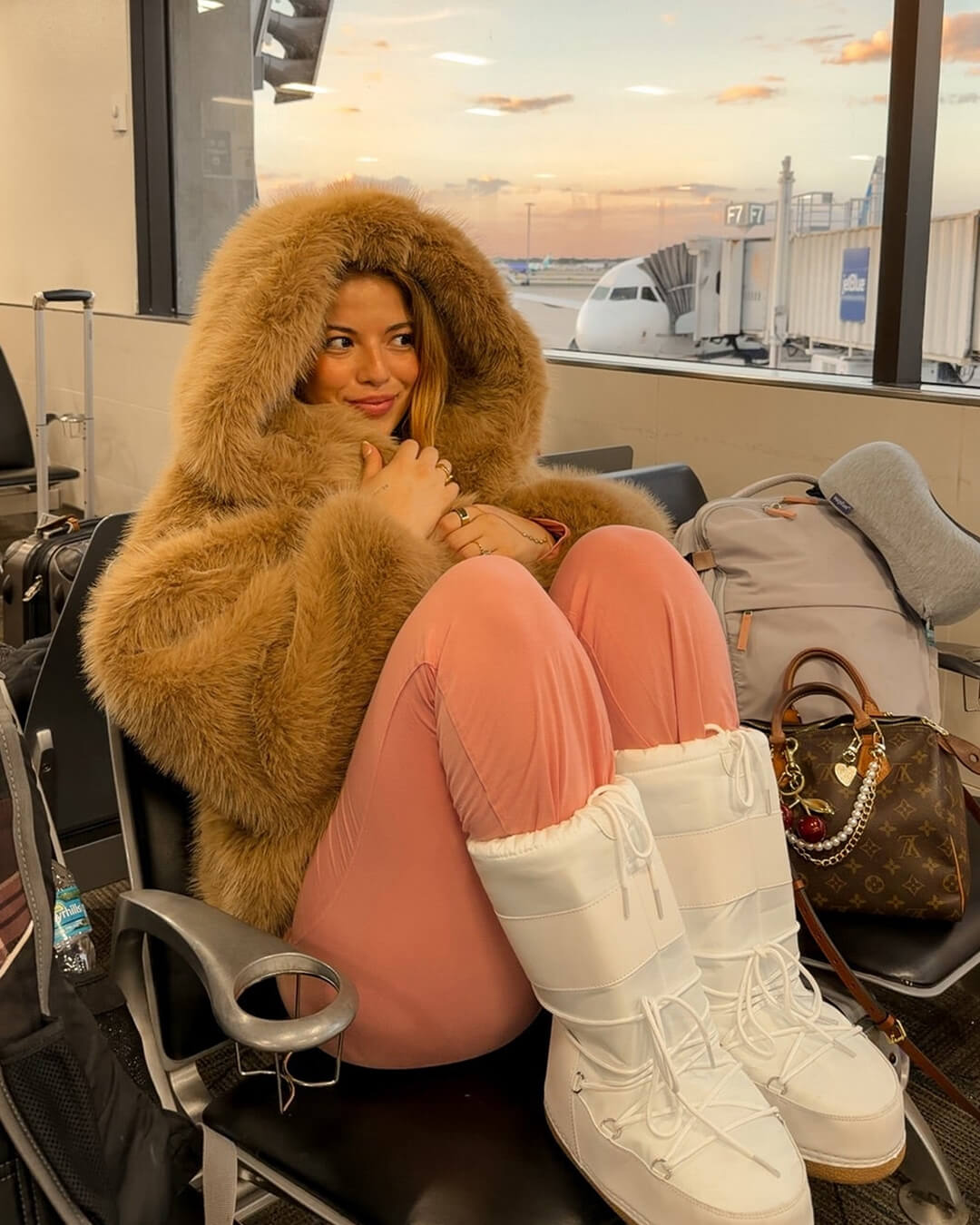 Manteau Nicki à capuche en fausse fourrure