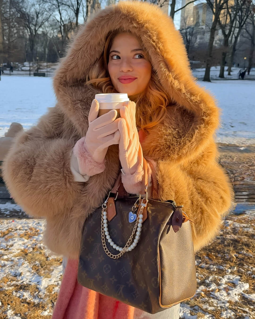 Manteau Nicki à capuche en fausse fourrure