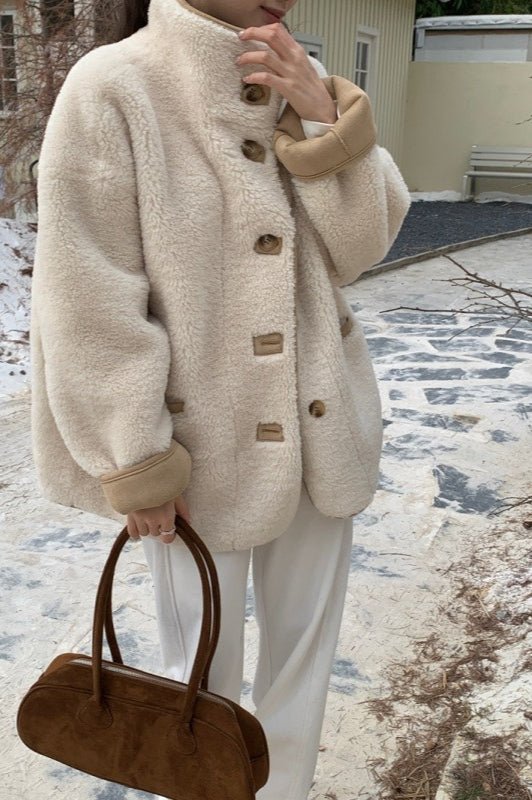Manteau en fausse fourrure à col montant Vanya