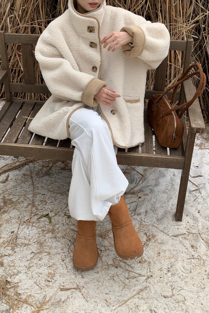 Manteau en fausse fourrure à col montant Vanya