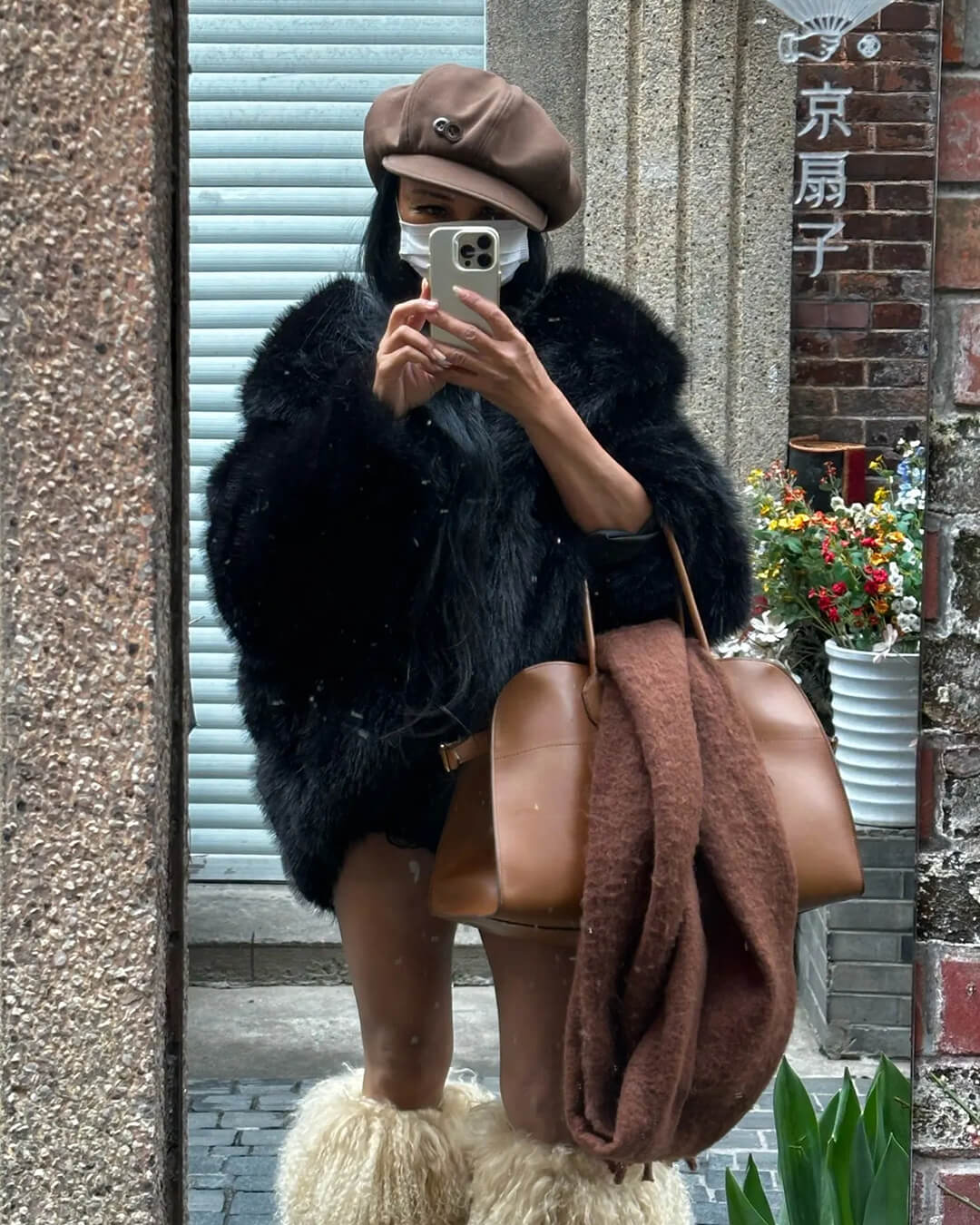 Manteau Nicki à capuche en fausse fourrure