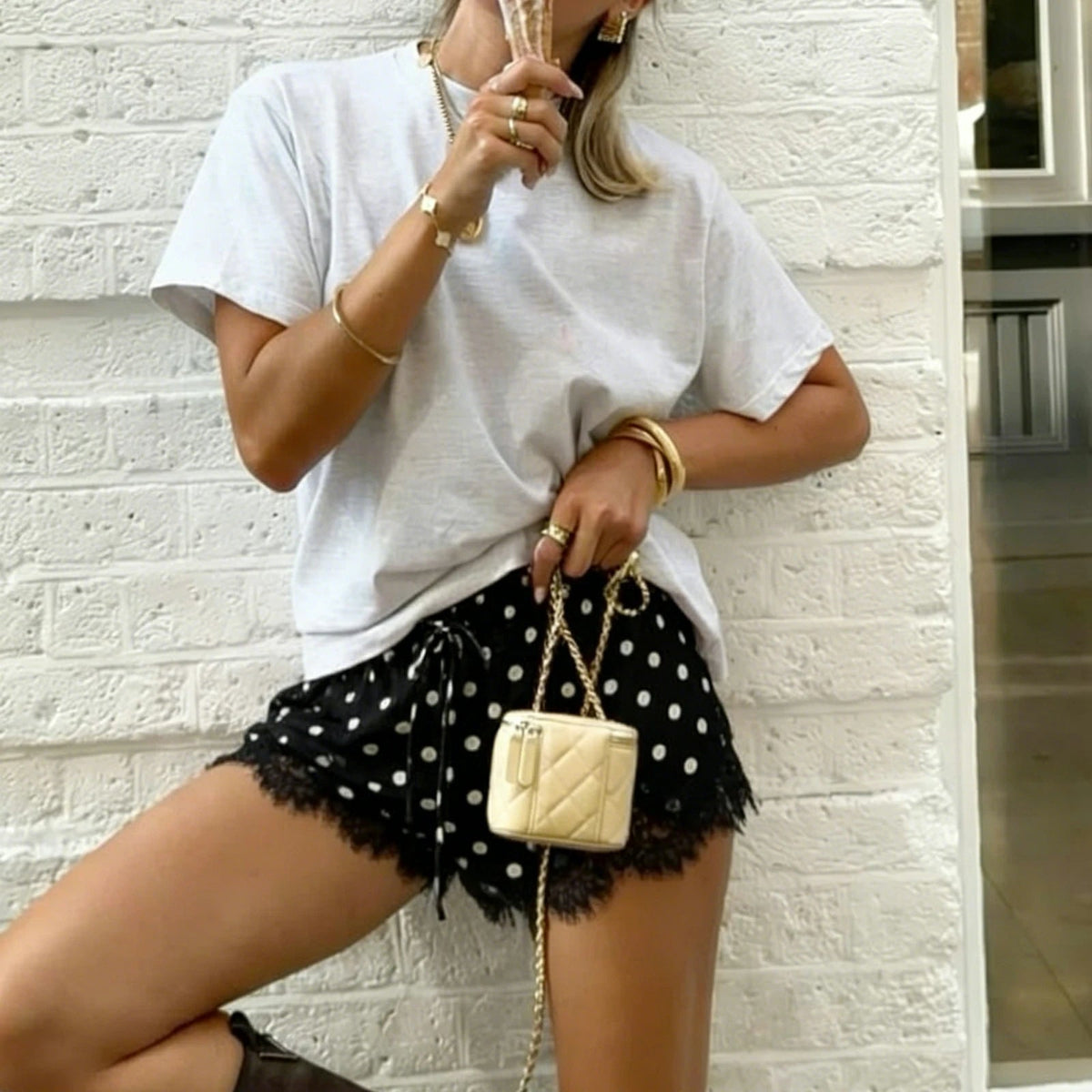 Short Paula noir en satin à pois