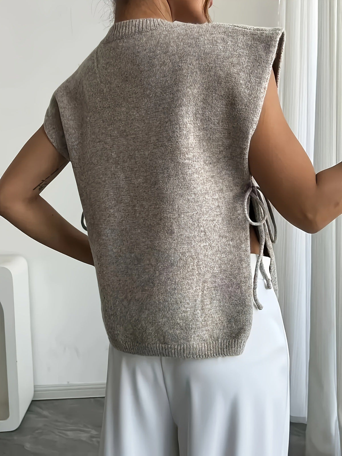 Top en maille Clara avec nœud latéral