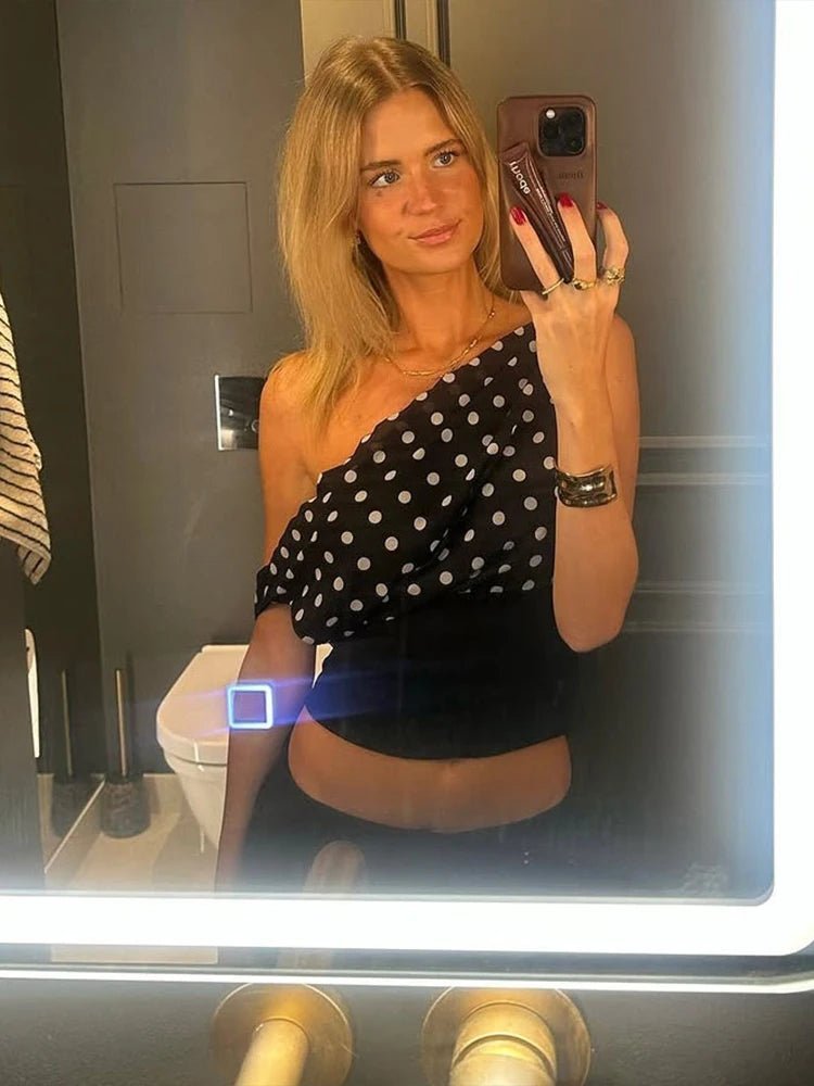 Top à pois avec col asymétrique Dianne