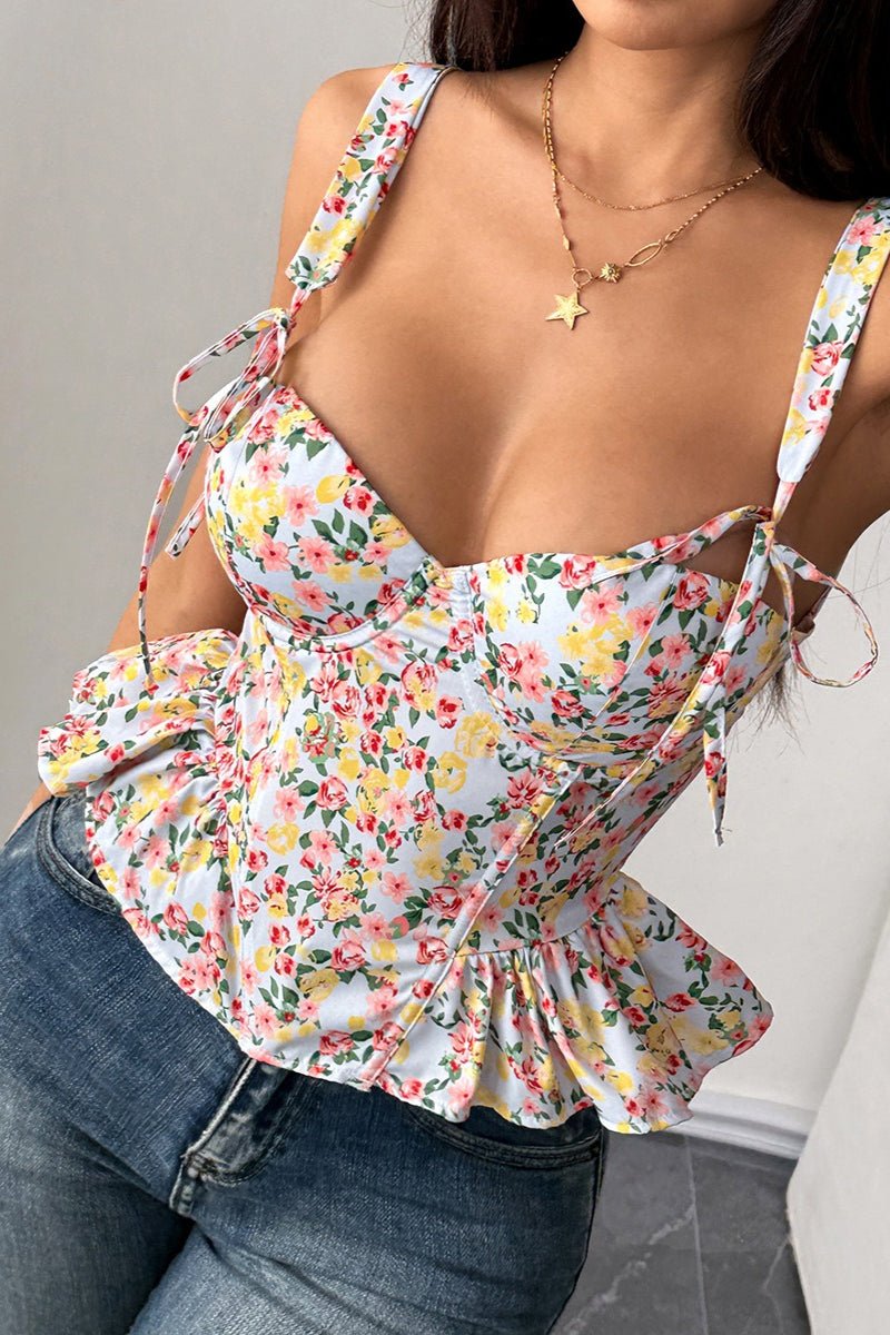 Top Elara style péplum à fleurs