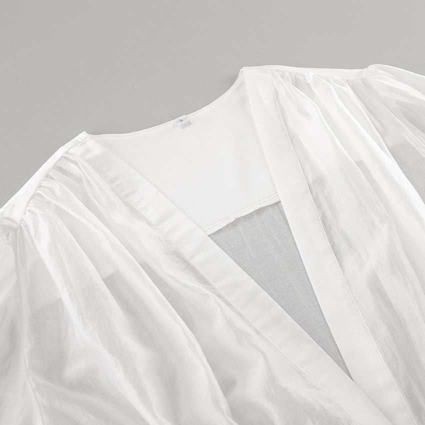 Blouse Elisa transparente à décolleté plongeant et boutons
