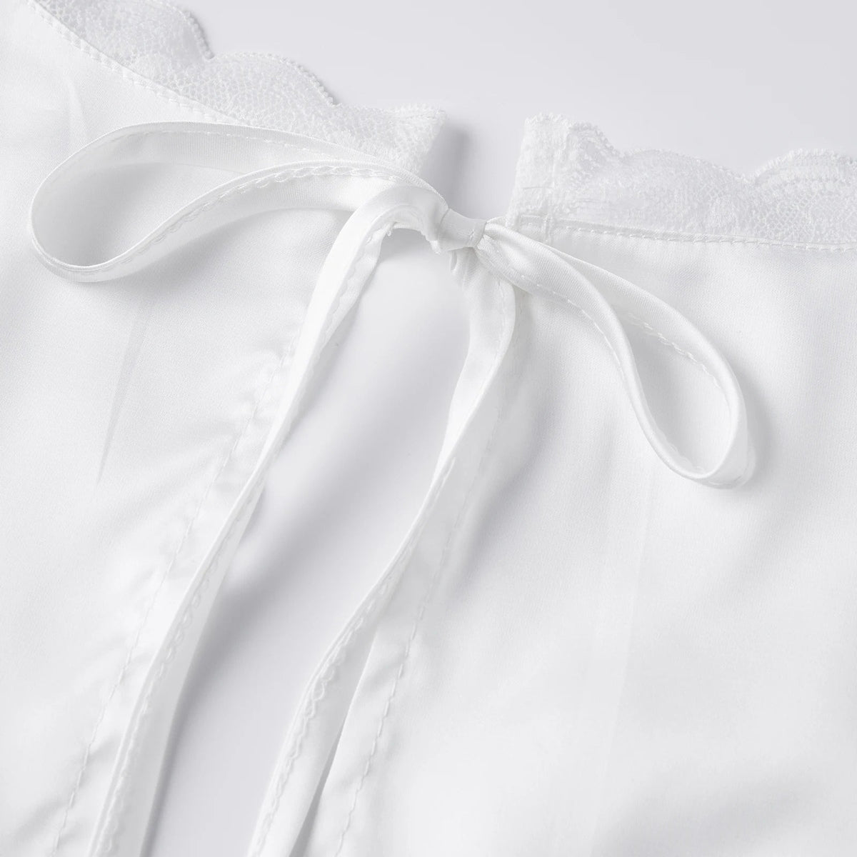 Top Francesca en satin à décolleté plongeant