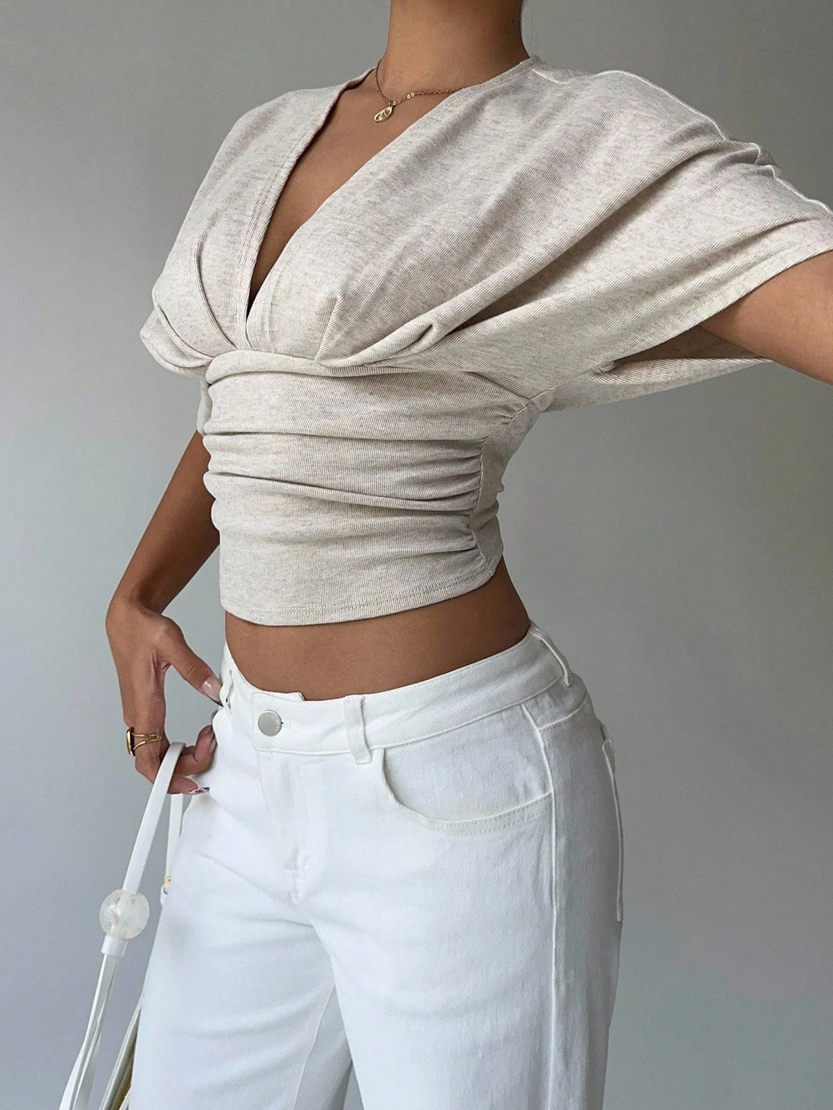 Blouse Kendra ajustée à décolleté plongeant