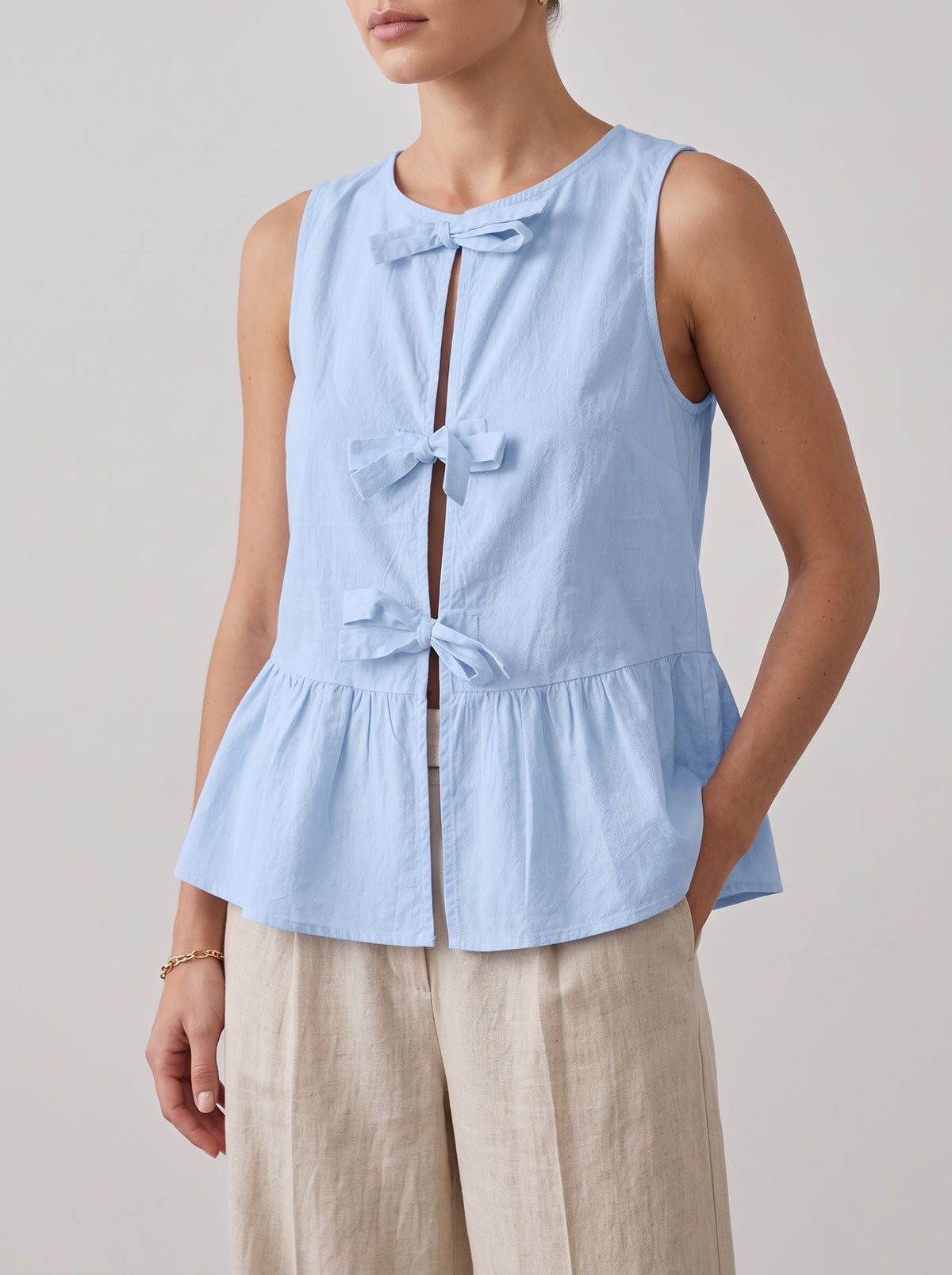 Bianca Sleeveless Bow Peplum Top — Blue