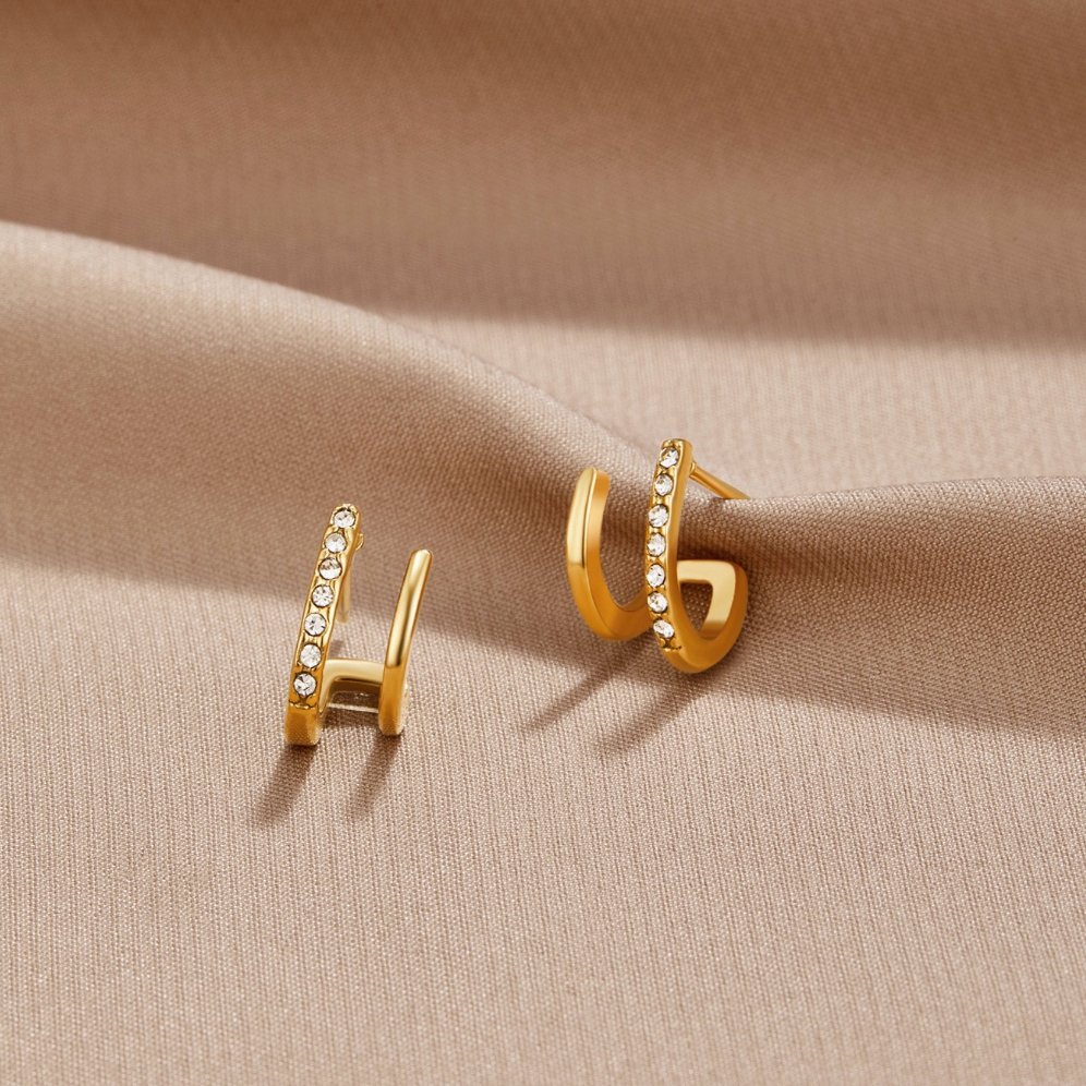 Boucles d'oreilles griffe or 18K et cristal