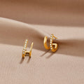 Boucles d'oreilles griffe or 18K et cristal