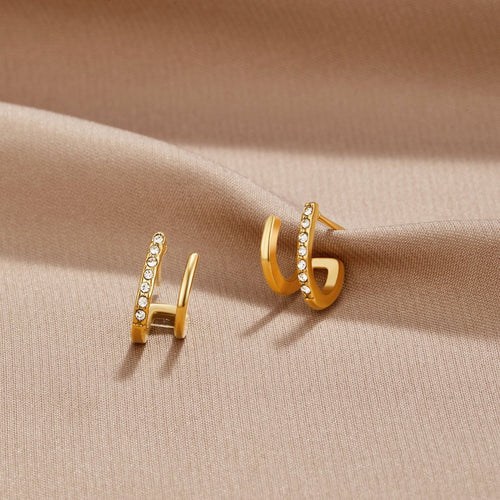 Boucles d'oreilles griffe or 18K et cristal