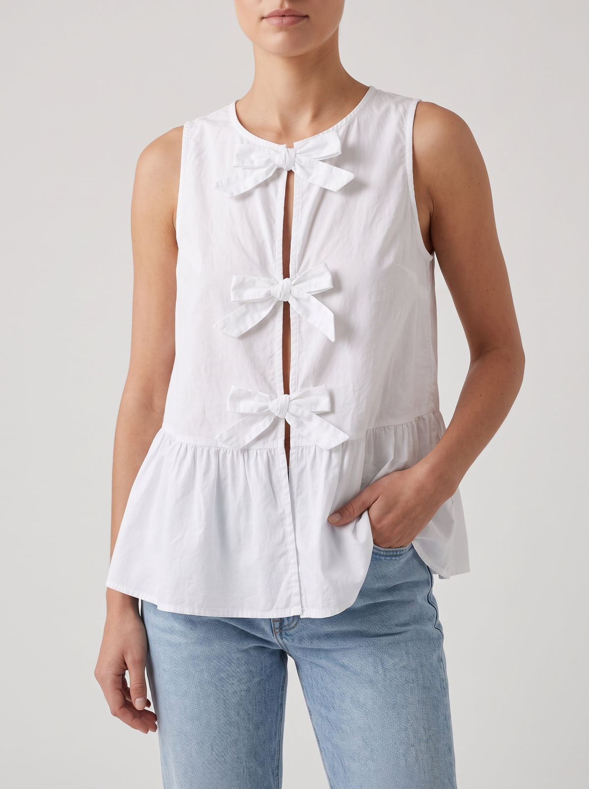 Bianca Sleeveless Bow Peplum Top — White