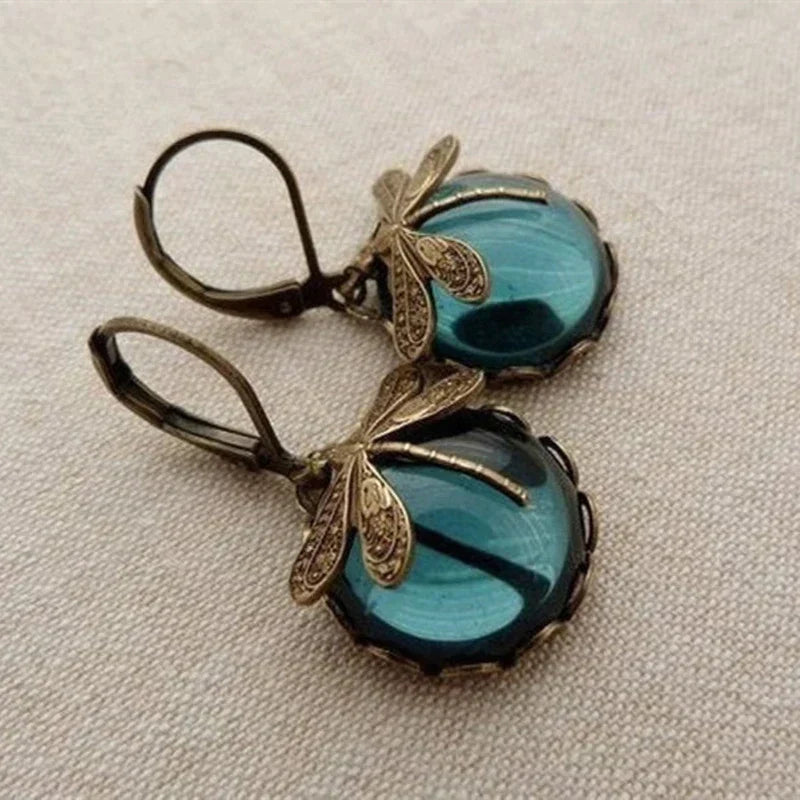 Boucles d'oreilles libellule sphérique or antique