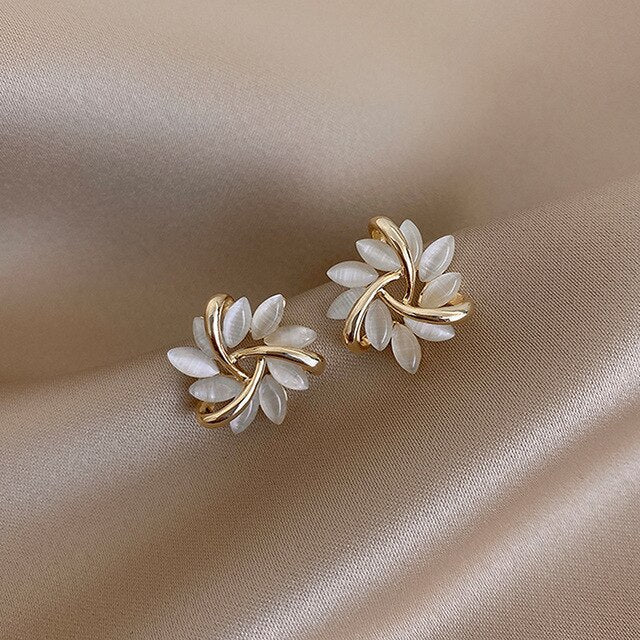 Sonja Luxe · Boucles d'oreilles en opale blanche