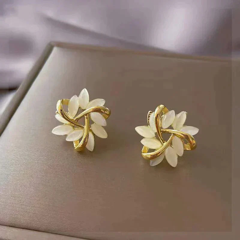 Sonja Luxe · Boucles d'oreilles en opale blanche