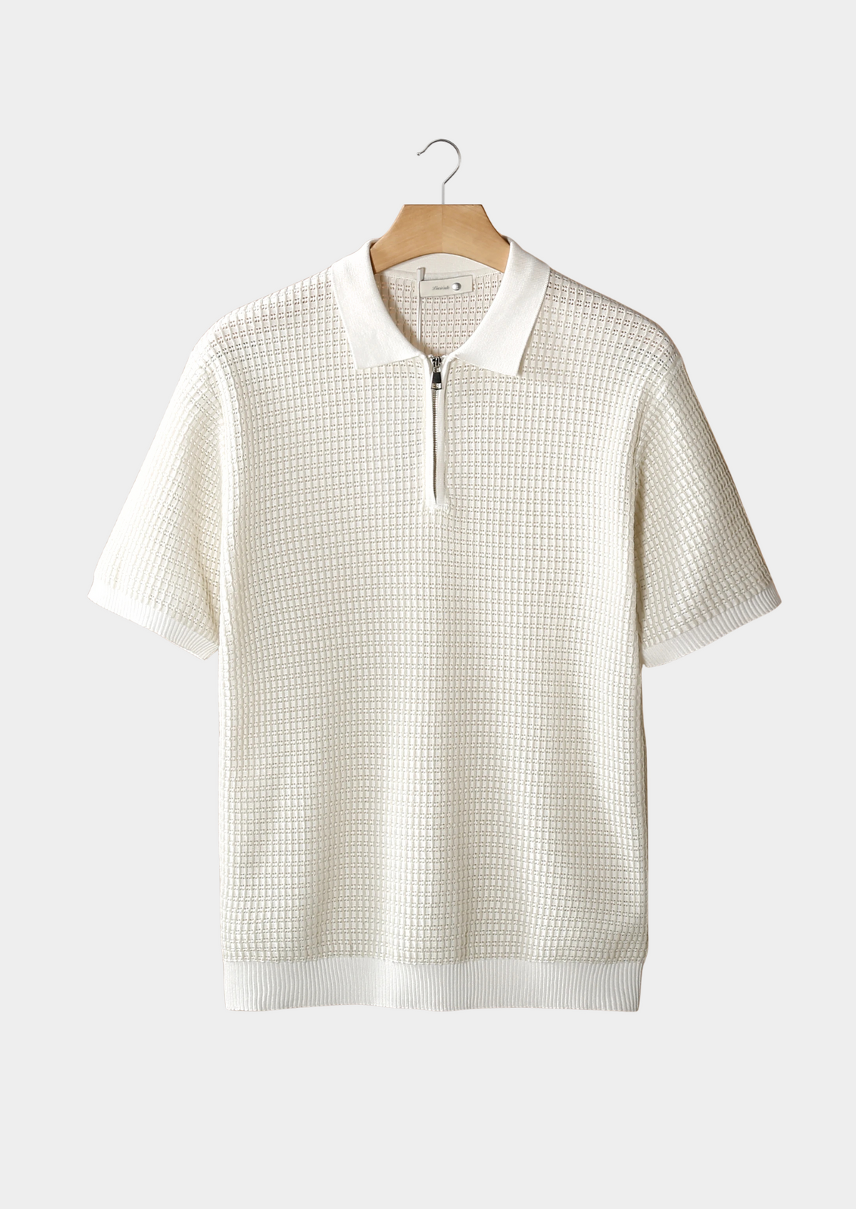 Polo zippé texturé géométrique blanc