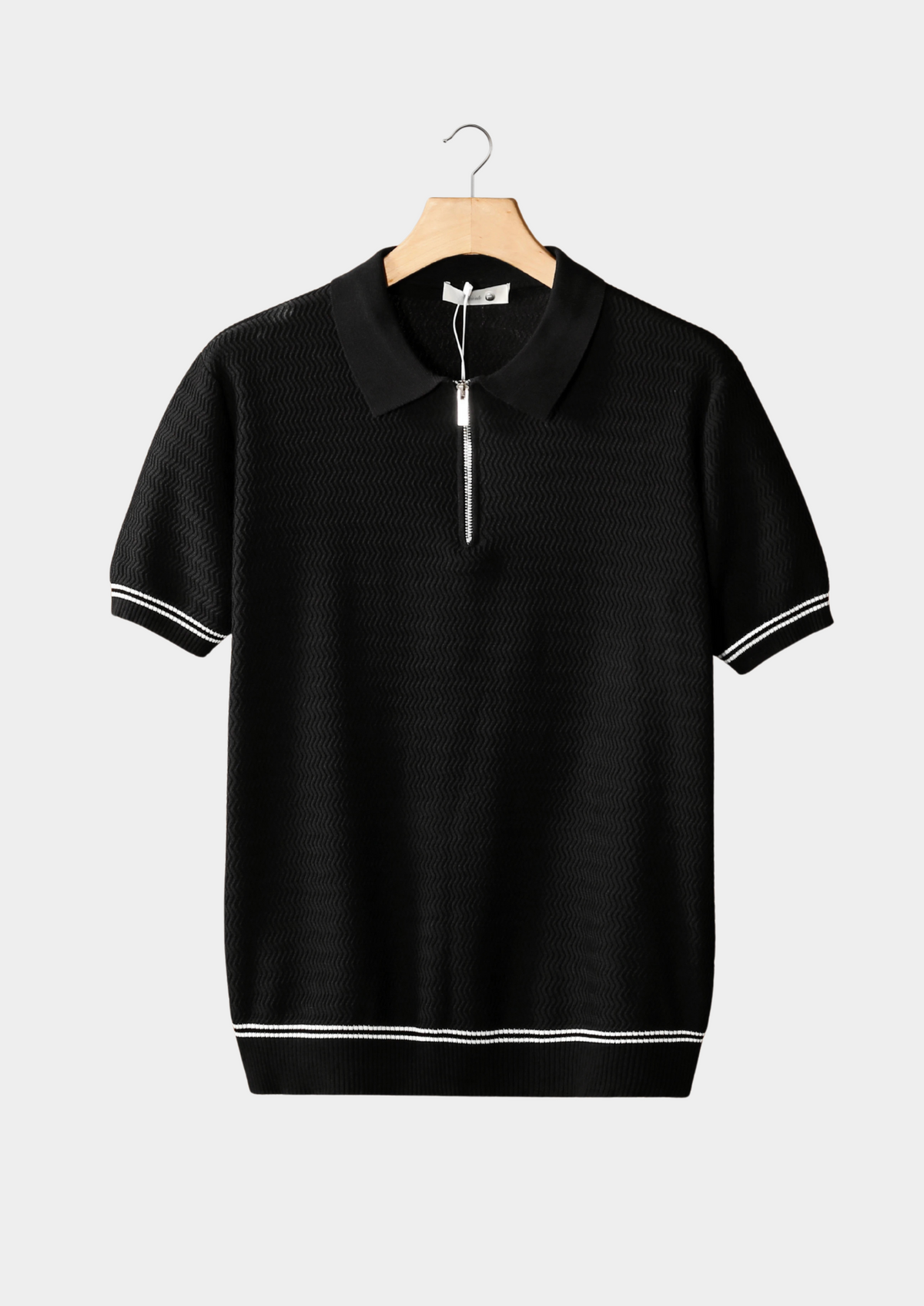 Polo zippé texturé zigzag noir