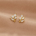 Puces d'oreilles feuille en cristal