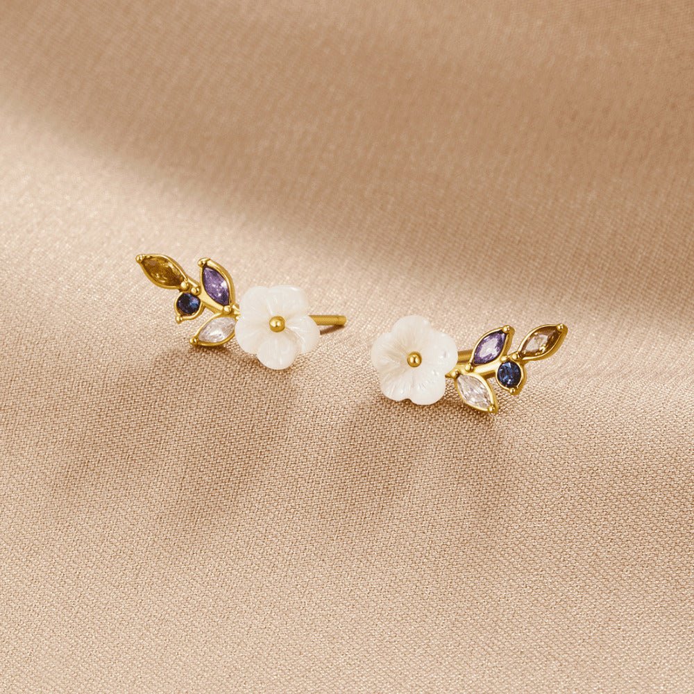 Puces d'oreilles fleur de cerisier en cristal