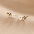 Puces d'oreilles fleur de cerisier en cristal