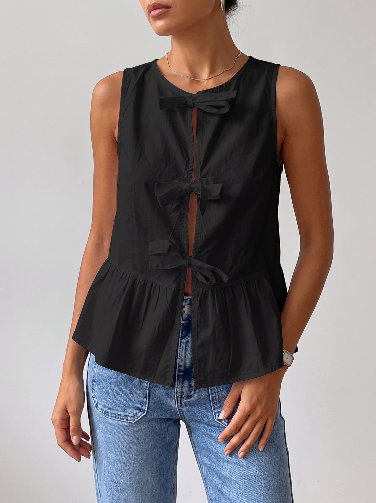 Bianca Sleeveless Bow Peplum Top — Black