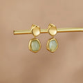 Boucles d'oreilles pendantes aigue-marine dorées