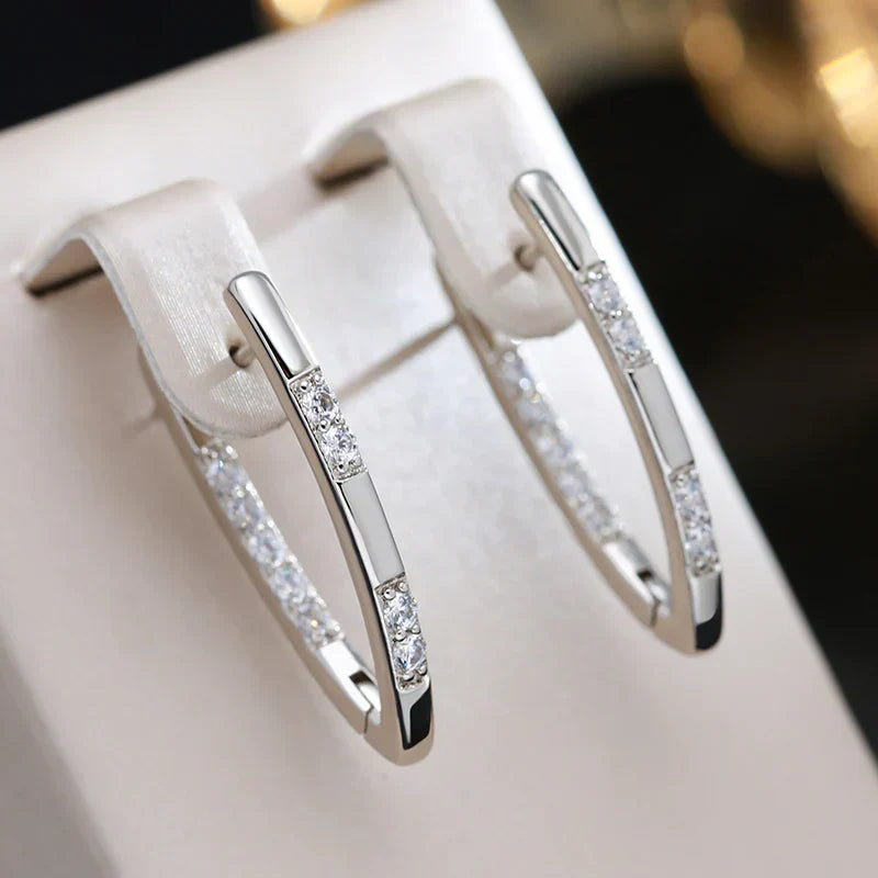 Sylvia · Boucles d'oreilles élégantes en zircone