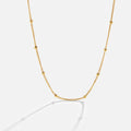 Collier Niyah chaîne et perles dorées