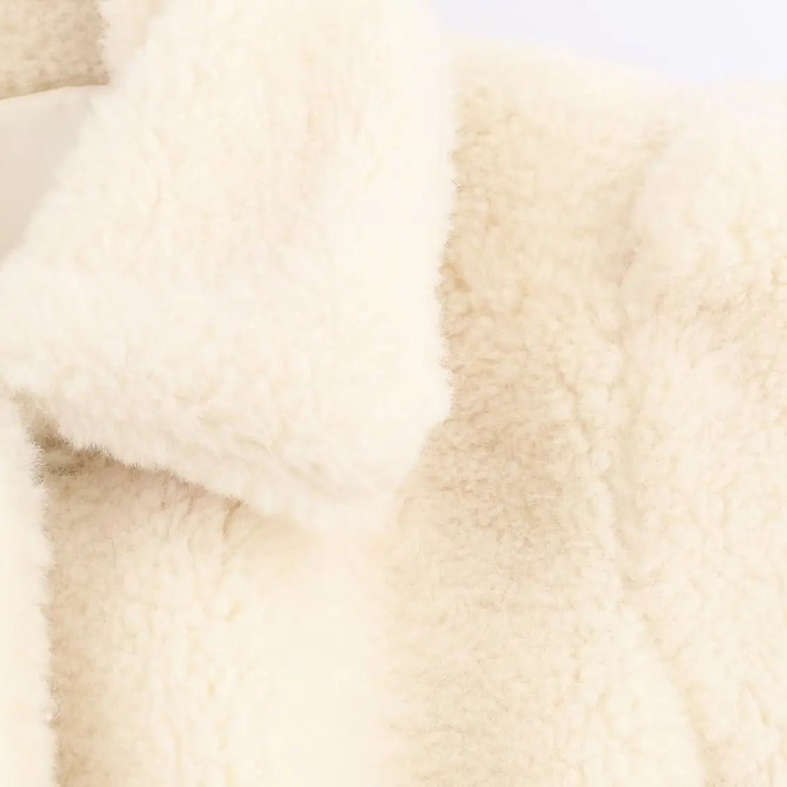 Manteau Aellinne en fausse fourrure avec ceinture