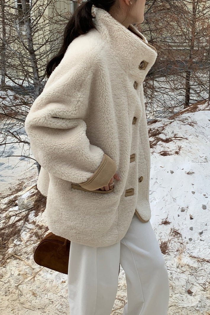 Manteau en fausse fourrure à col montant Vanya