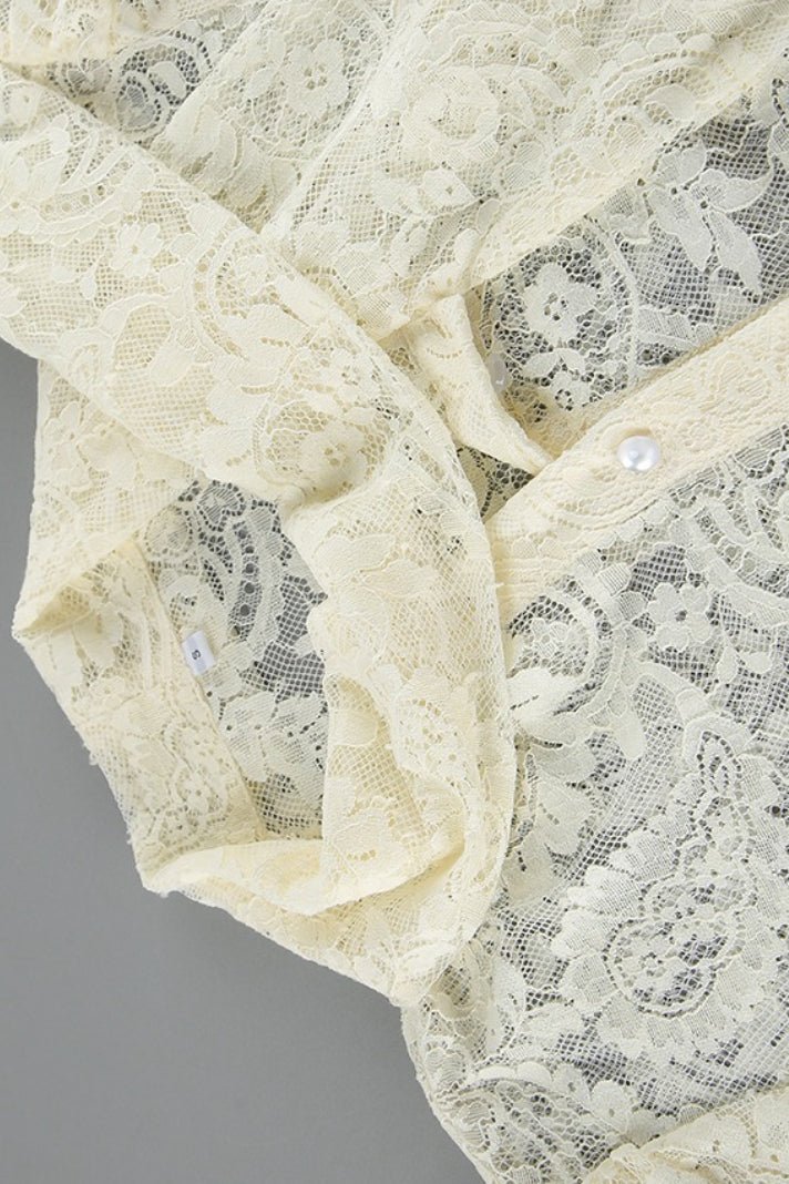 Blouse Dunja en dentelle transparente avec nœud