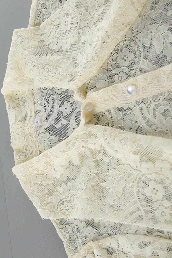 Blouse Dunja en dentelle transparente avec nœud