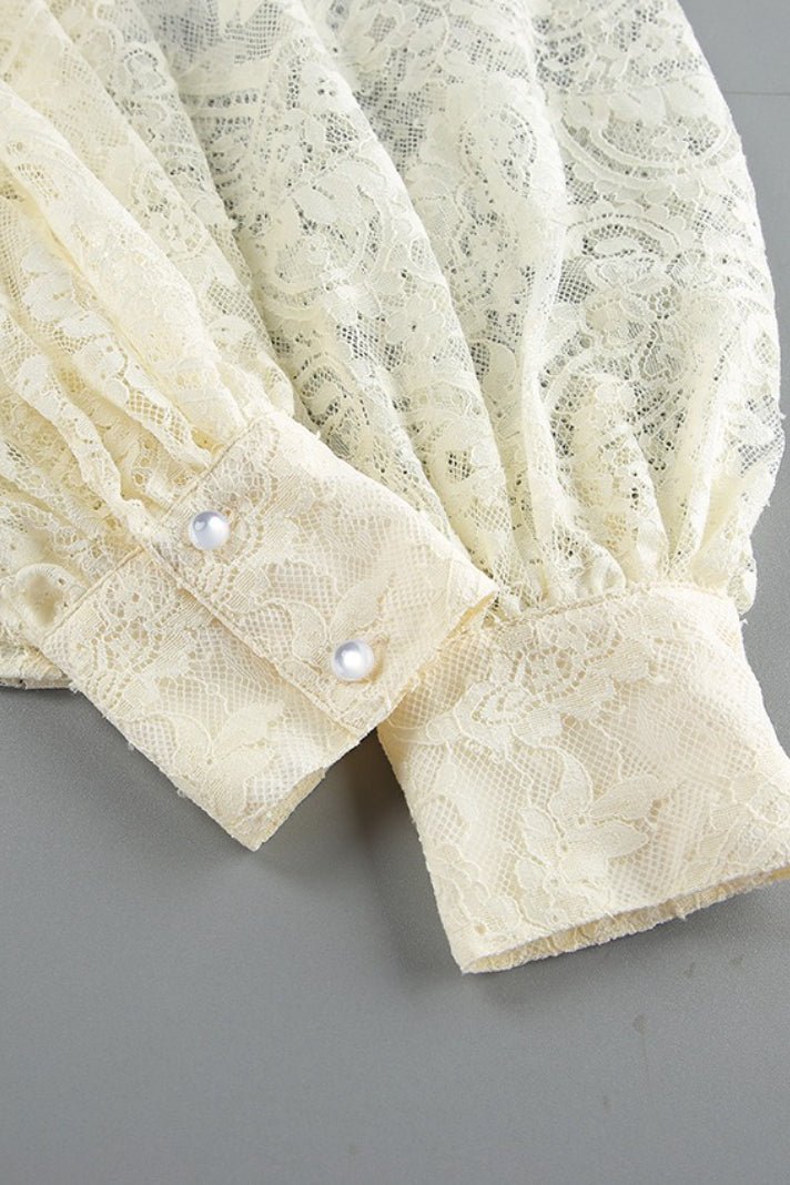 Blouse Dunja en dentelle transparente avec nœud