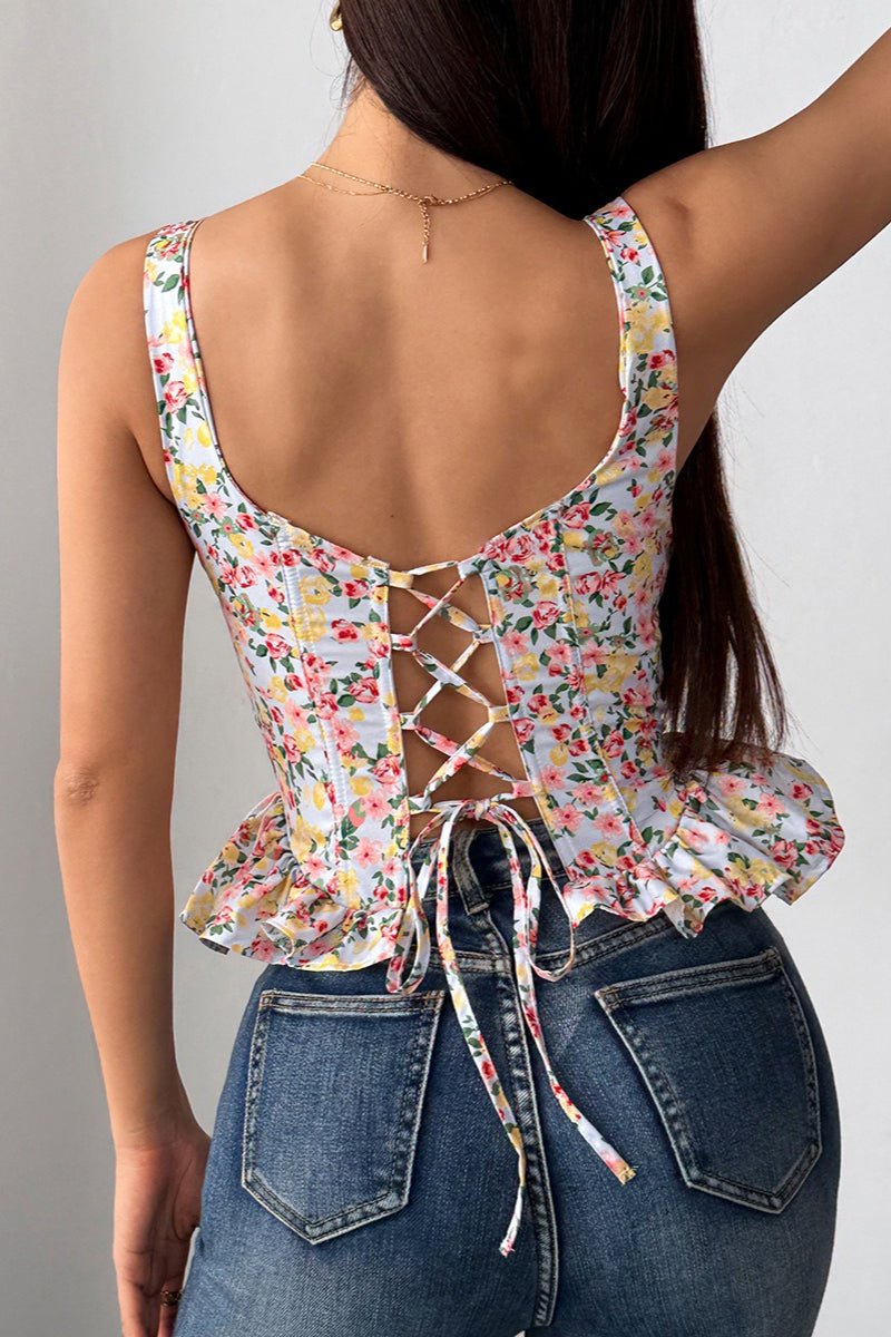 Top Elara style péplum à fleurs