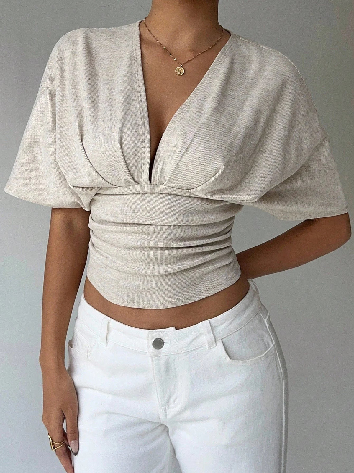 Blouse Kendra ajustée à décolleté plongeant