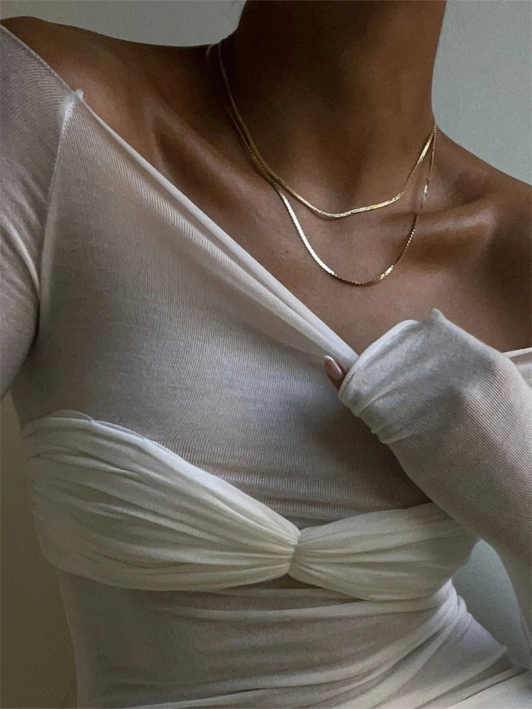 Top Sara en résille transparente à épaules dénudées